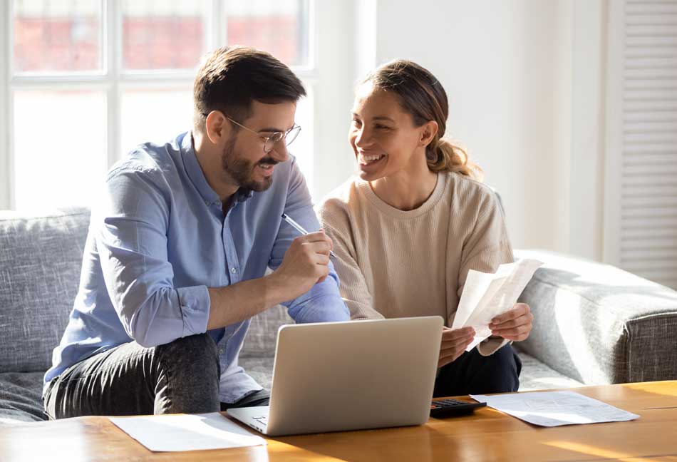 Couple happy with their new mortgage quote from Angus Mortage Services